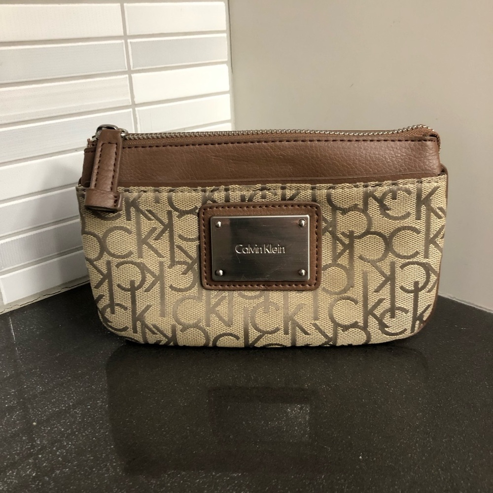 Calvin Klein monogram canvas and brown faux leather wristlet